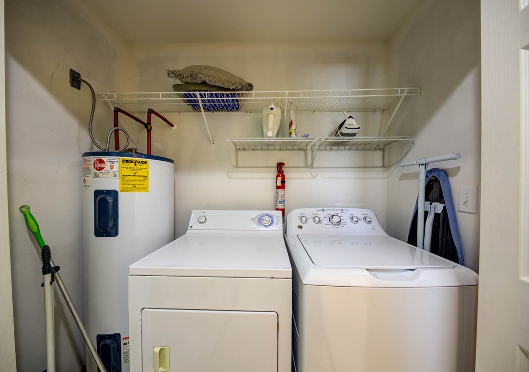 Washer and dryer in hallway.