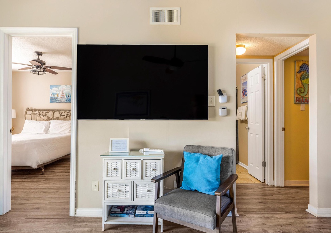 Living area with easy access to both bedrooms
