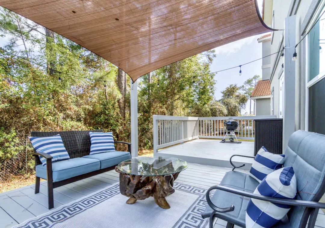 Covered porch and charcoal grill