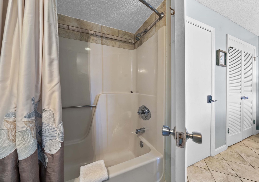 Primary bathroom with shower/tub combo