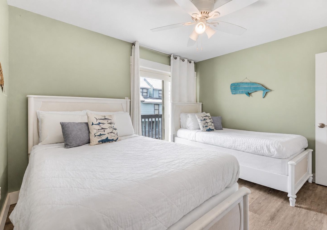 Guest bedroom 2 with one double bed and one twin bed