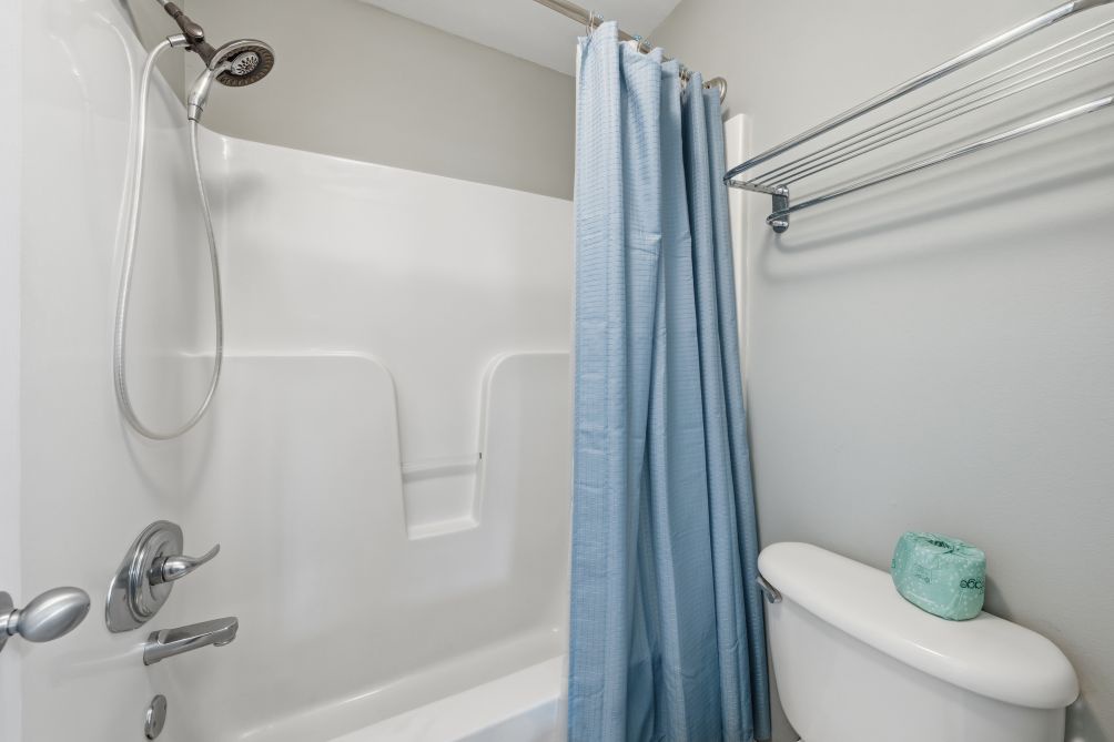 Primary bathroom with shower/tub combo