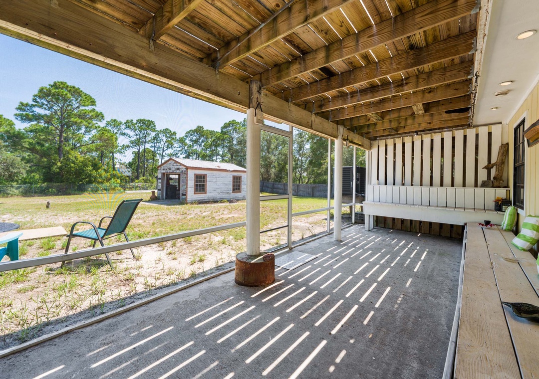Covered porch and backyard