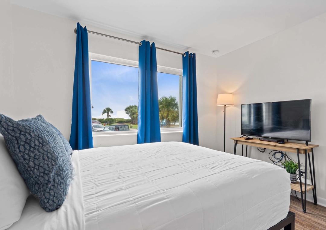 Primary bedroom with queen bed