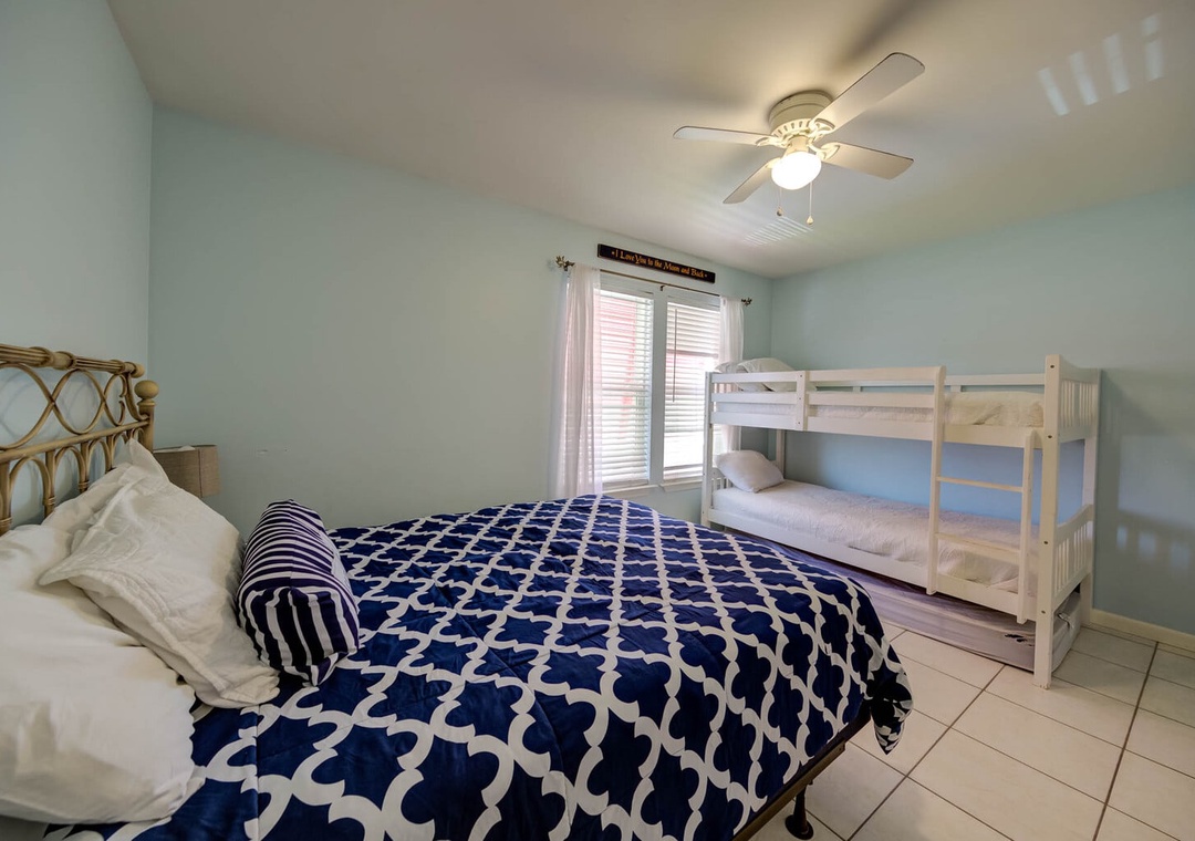 Second bedroom with queen-size bed and twin-size bunk bed.