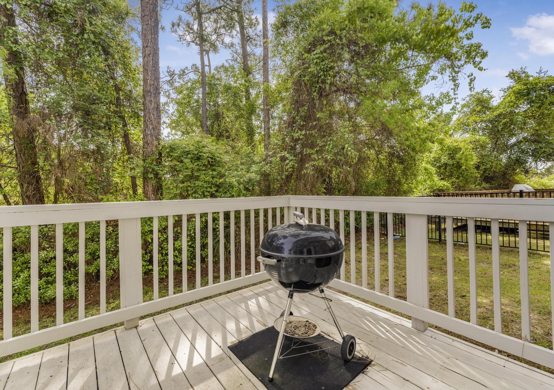 Charcoal grill on the back porch