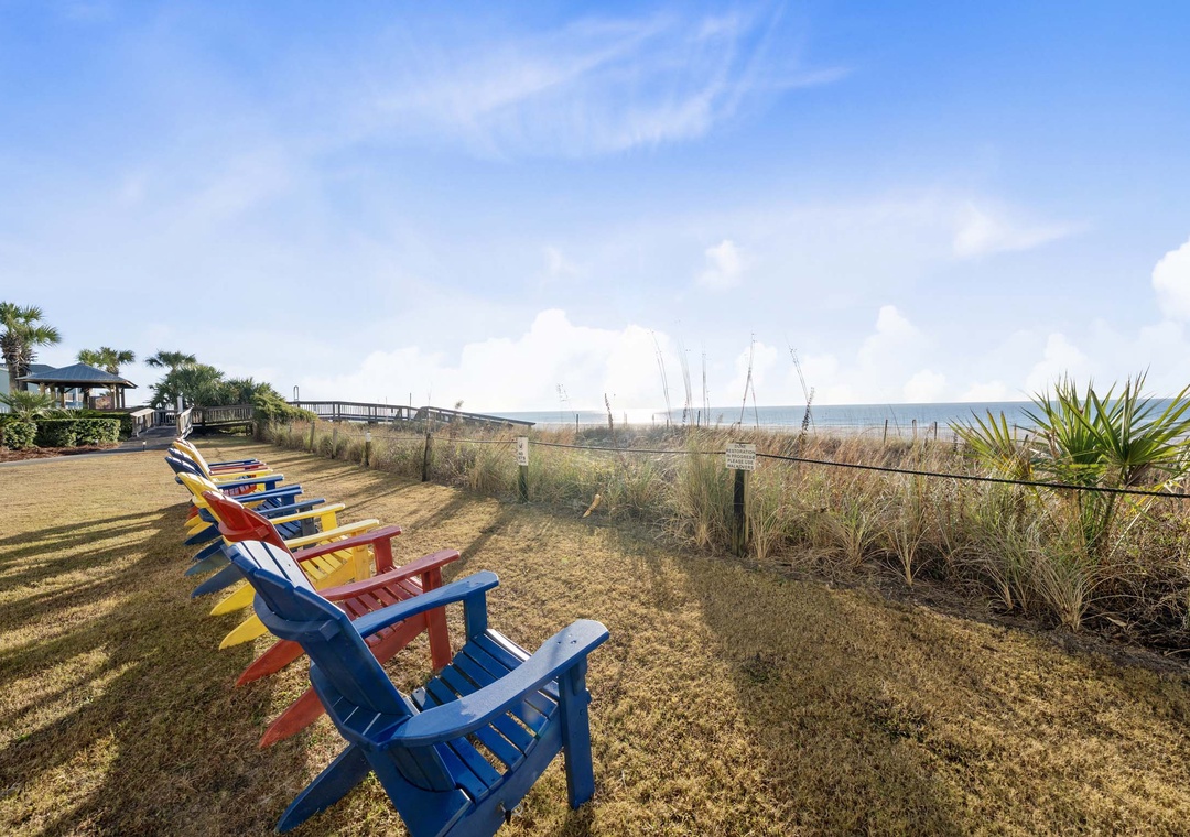 Adirondack chairs overlooking the water