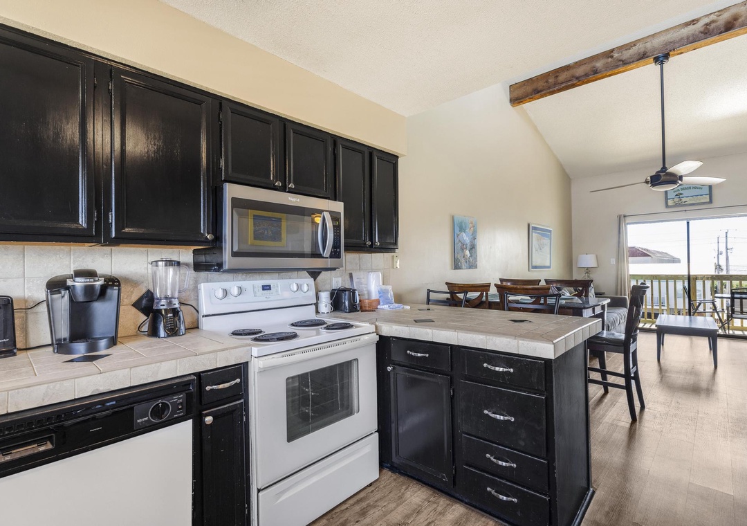 Open kitchen flowing into the dining and living areas