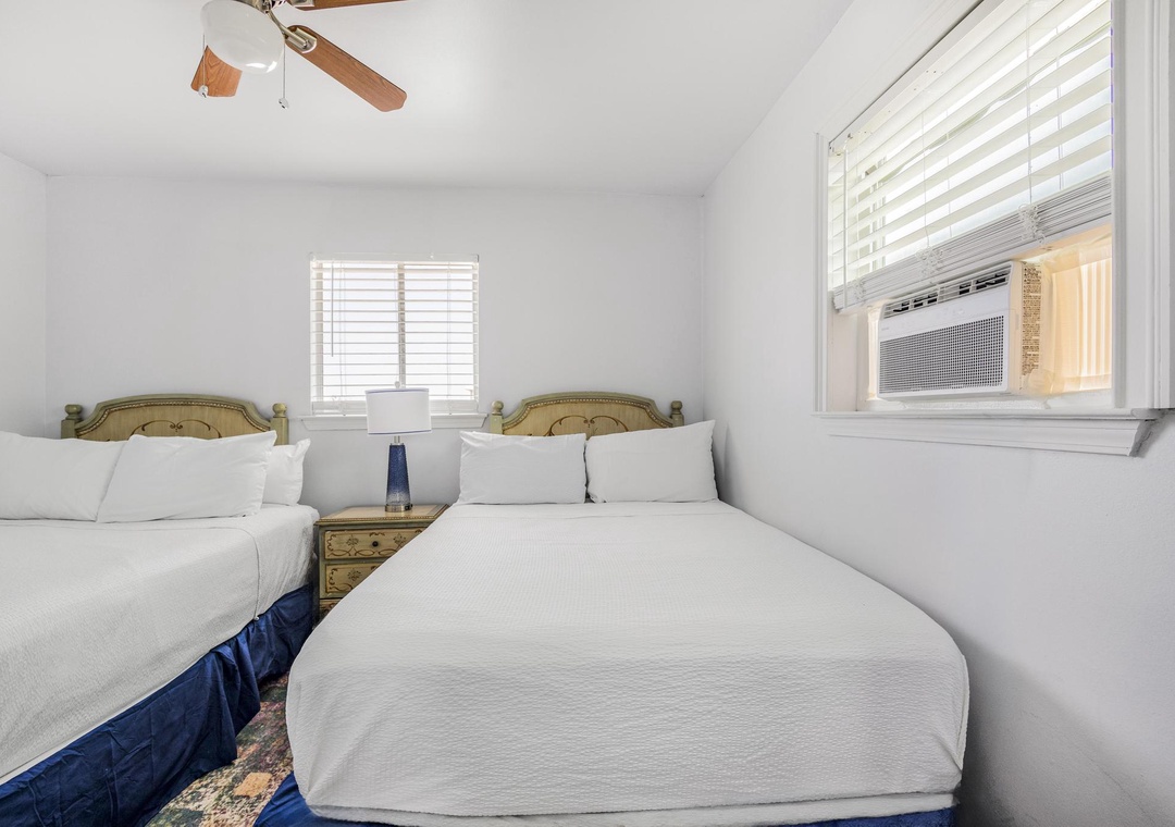 Guest bedroom 2 with two full beds