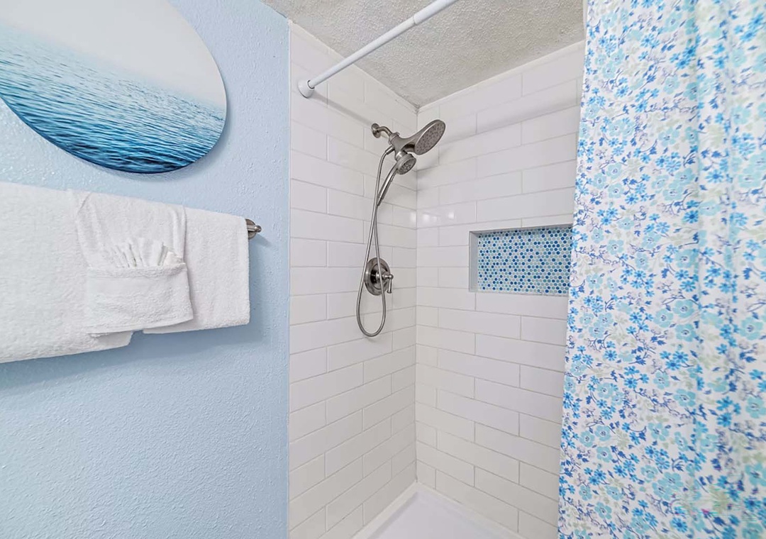 Fully tiled shower in the bathroom