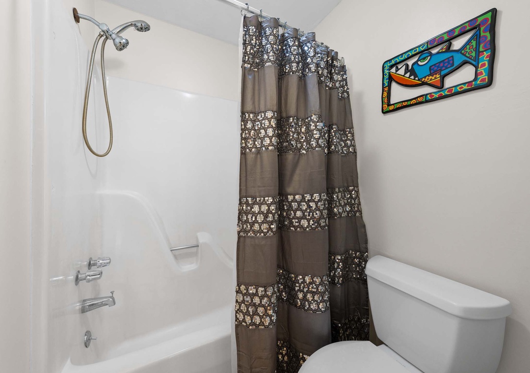 Second floor guest bathroom with shower/tub combo