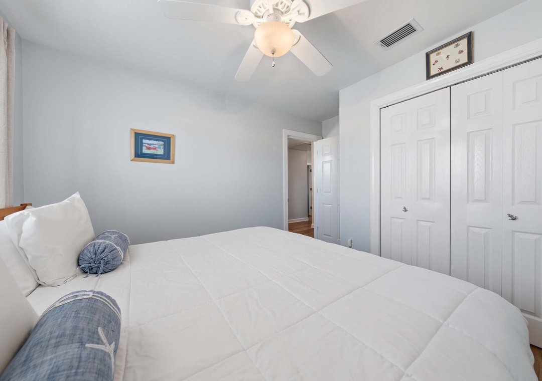 First floor guest bedroom with king bed