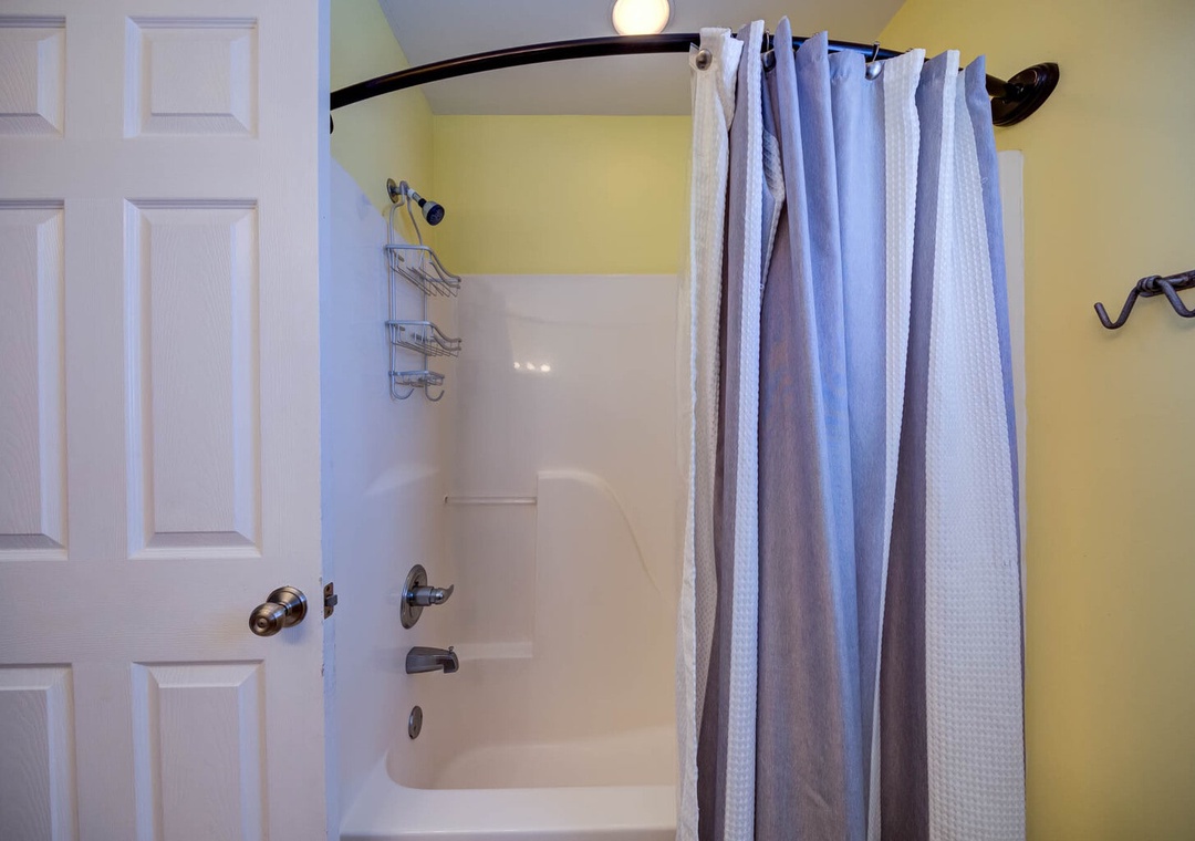 Second bathroom with shower/tub combo.
