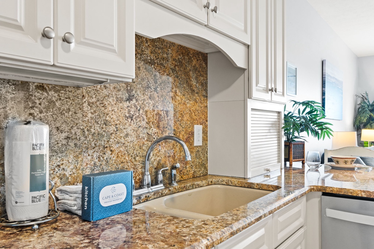 Your kitchen shines with elegant granite countertops and modern appliances, perfect for preparing meals with style and convenience.