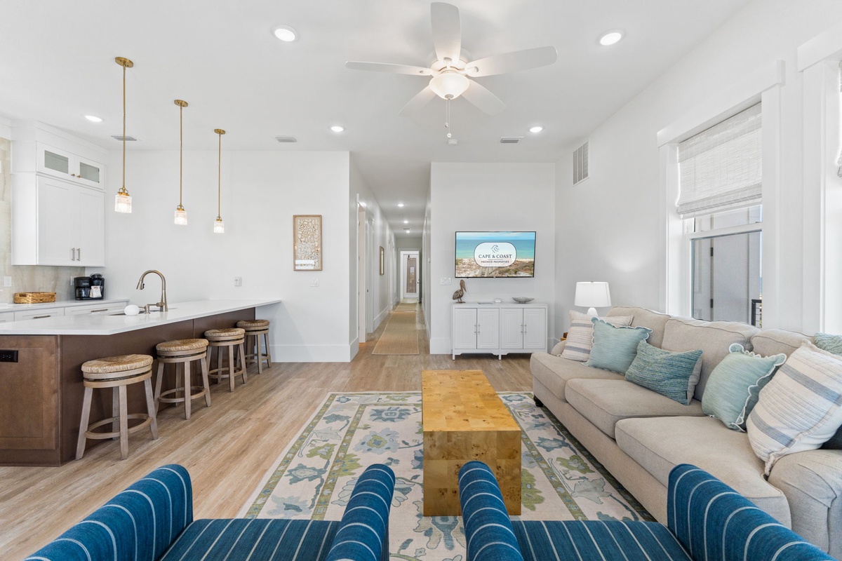 Relax in your bright, open-concept haven where the kitchen flows seamlessly into the living space, perfect for gathering.
