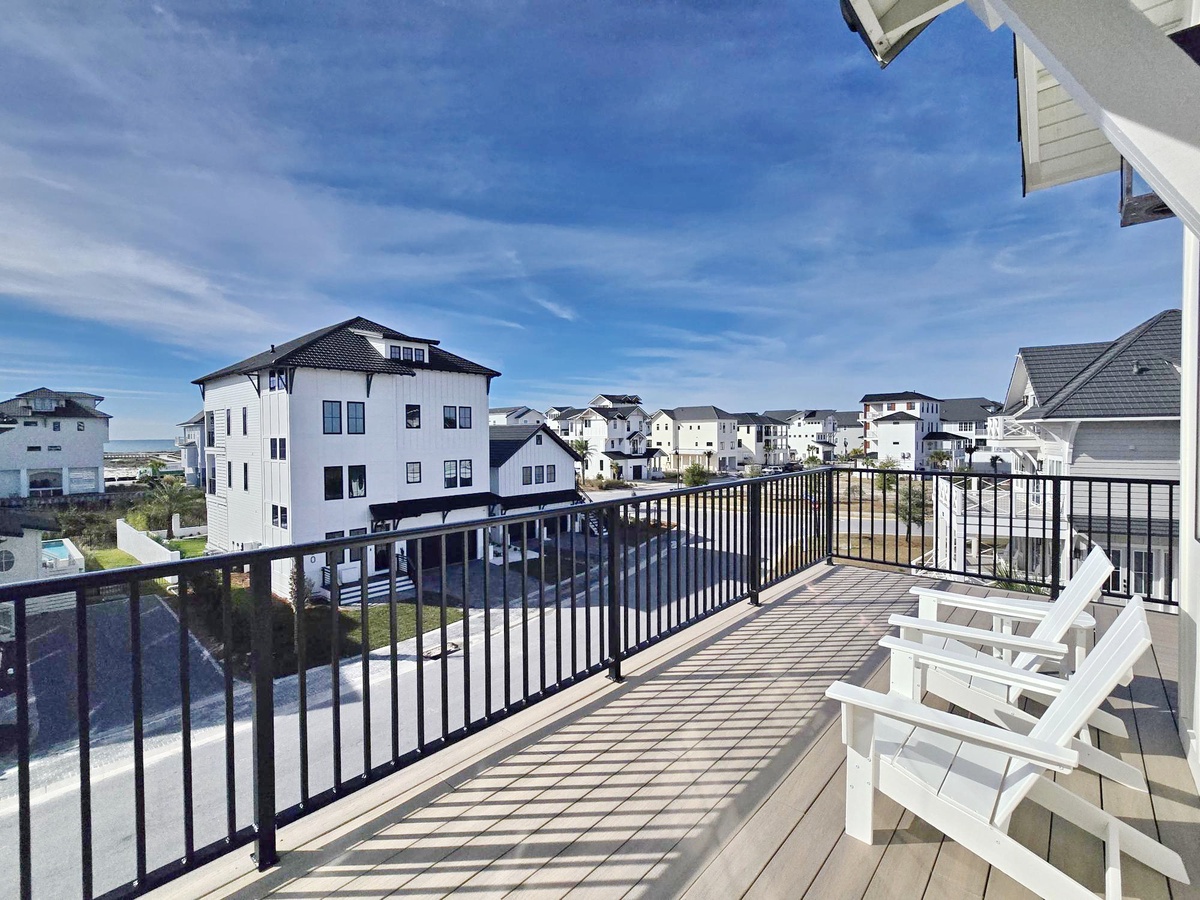 Step onto your private deck and breathe in the coastal air while enjoying elevated views of the charming beach neighborhood.