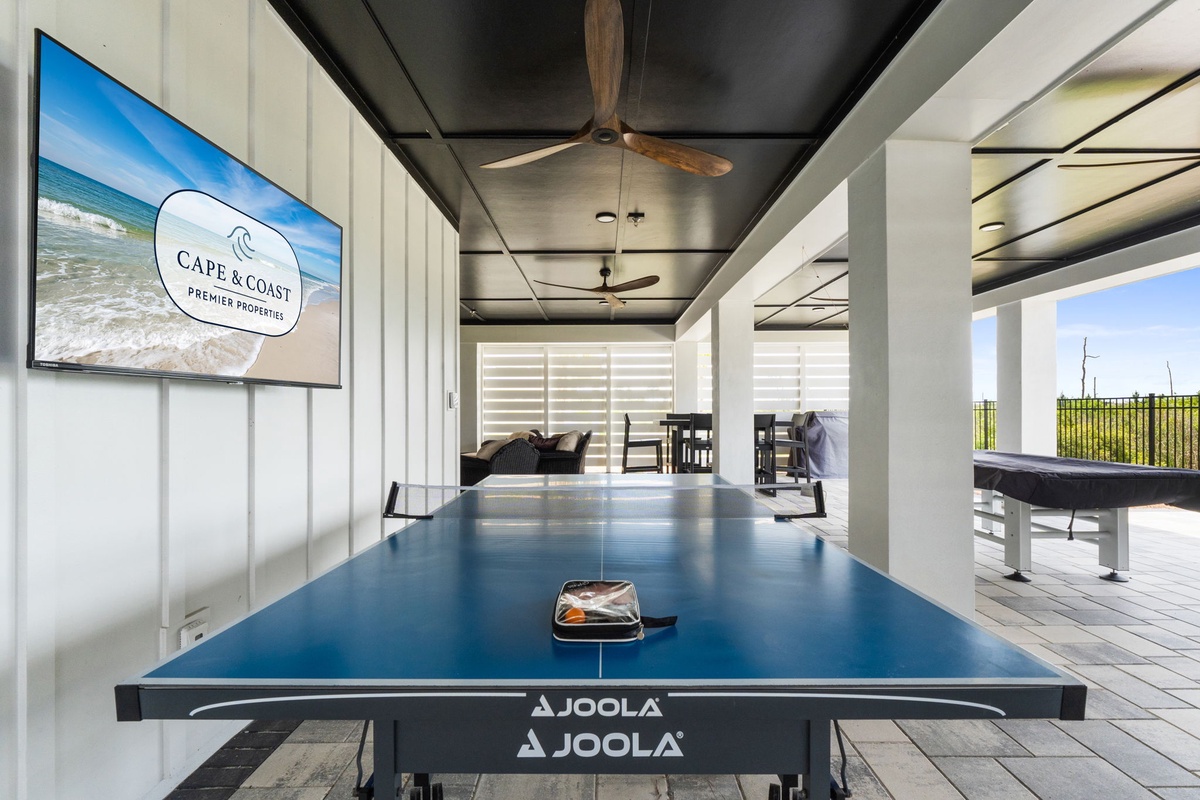 Challenge friends to table tennis on your covered deck, then relax outdoors with scenic views. Perfect for both play and unwinding.