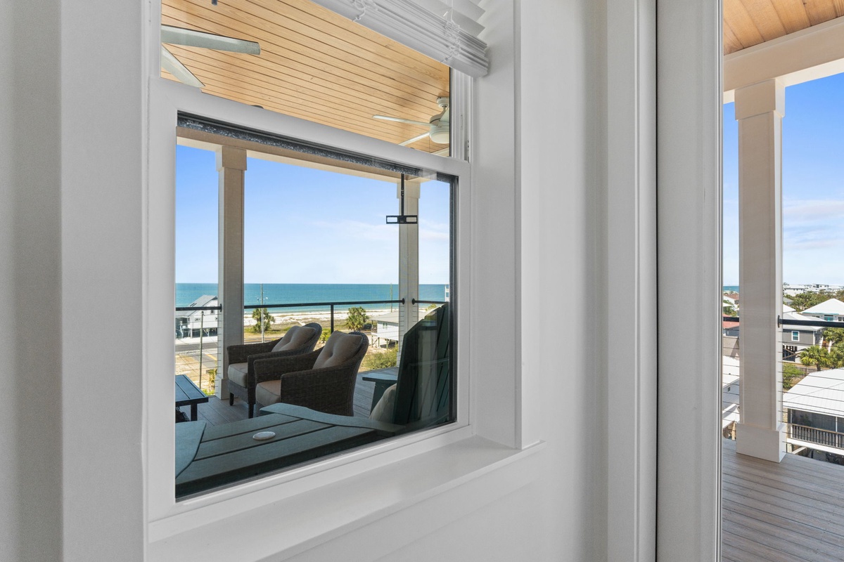 Wake up to breathtaking ocean views framed perfectly through your bedroom window, where turquoise waters stretch to the horizon.