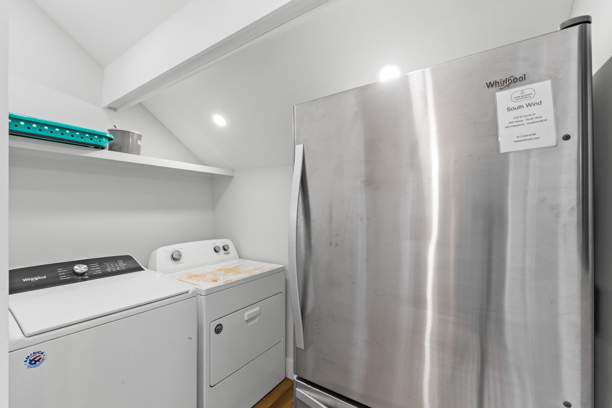 Your stay includes a well-equipped utility space with full-sized washer and dryer, plus a full refrigerator for keeping groceries fresh throughout your visit.