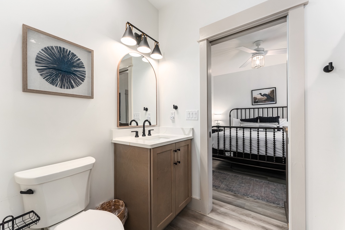 Your private bathroom features modern fixtures and thoughtful touches, connecting seamlessly to your cozy bedroom retreat.