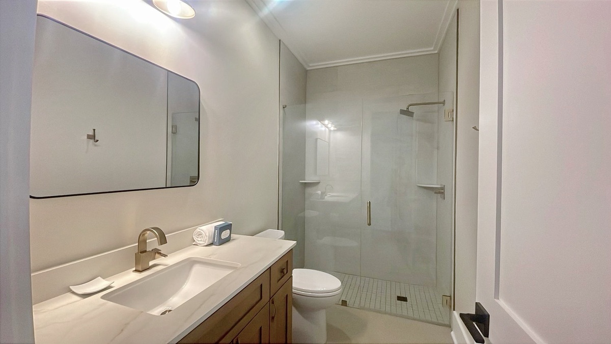 Step into your private sanctuary where clean lines and modern finishes create a spa-like retreat. Refresh under the rainfall shower and enjoy the comfort of your elegant, contemporary bathroom.