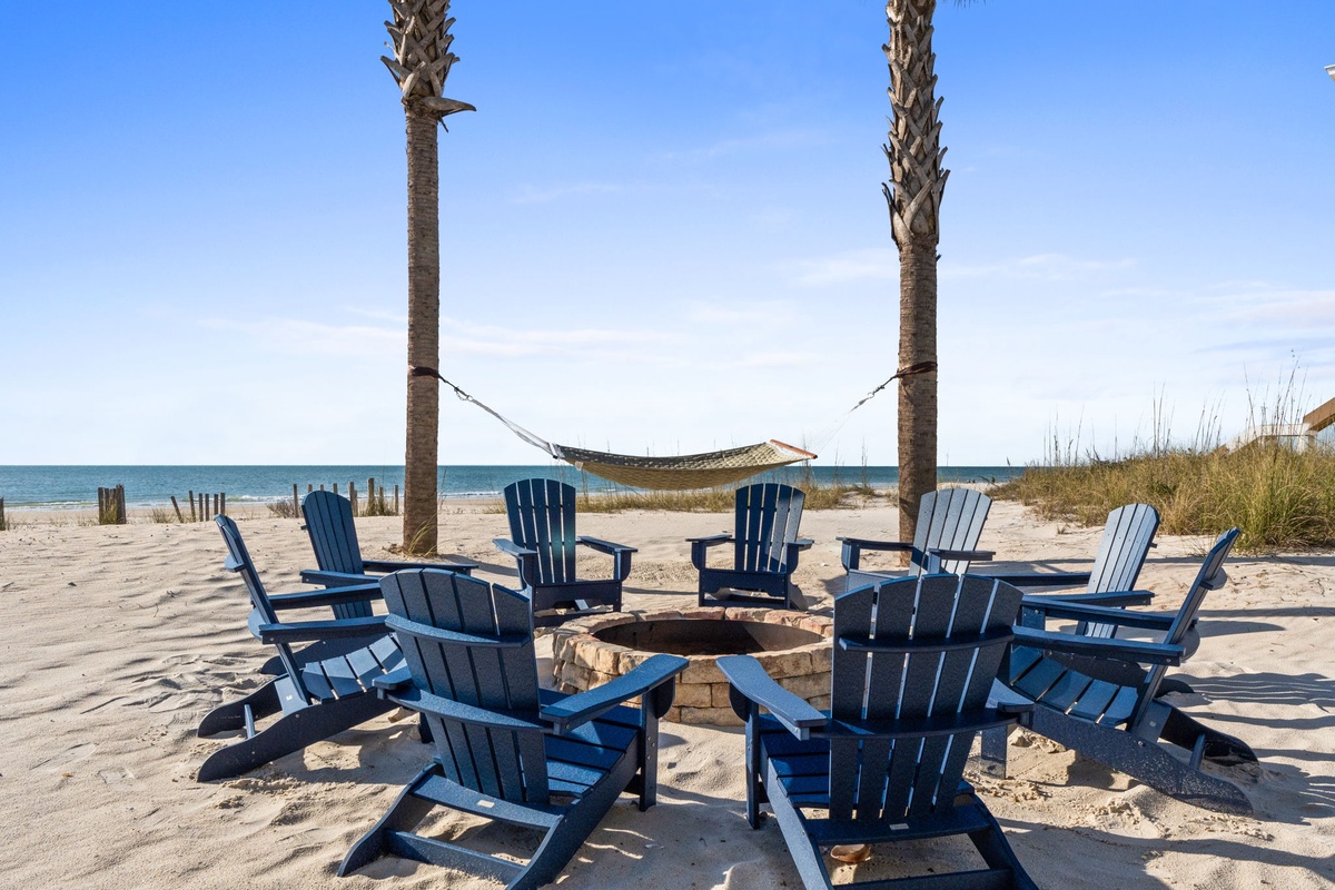 Sink into these Adirondack chairs around the beach fire pit, where your toes touch warm sand and ocean breezes carry away stress.