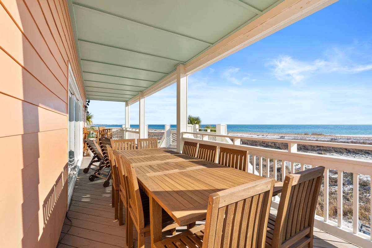 Your private covered deck with dining table offers front-row seats to endless ocean views and the sound of waves.
