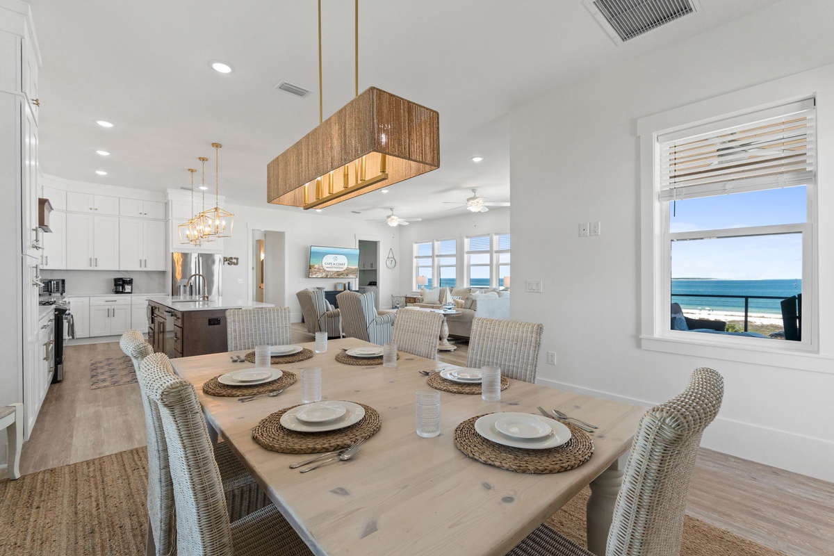 Gather around your beautifully appointed dining table with stunning ocean views streaming through the windows, creating the perfect backdrop for memorable meals.