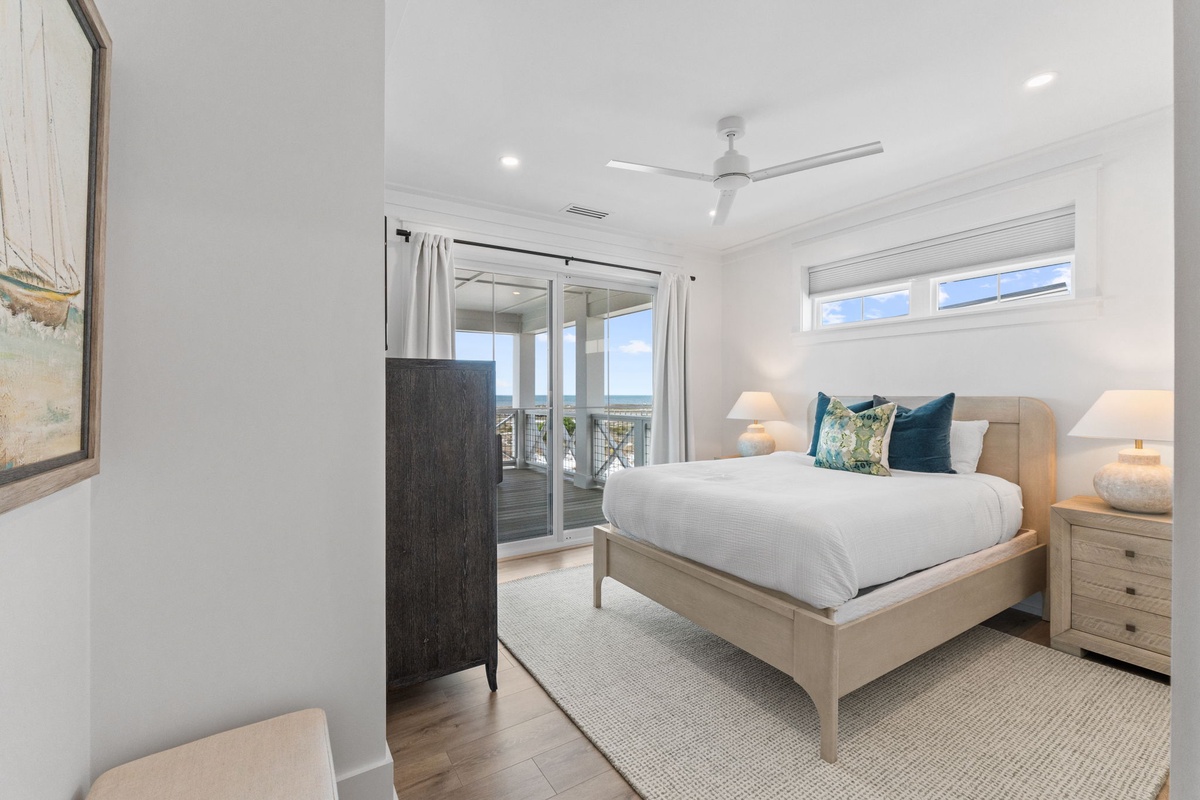 Wake up to ocean breezes in your peaceful bedroom, where soft linens and coastal views create the perfect retreat for restful nights.