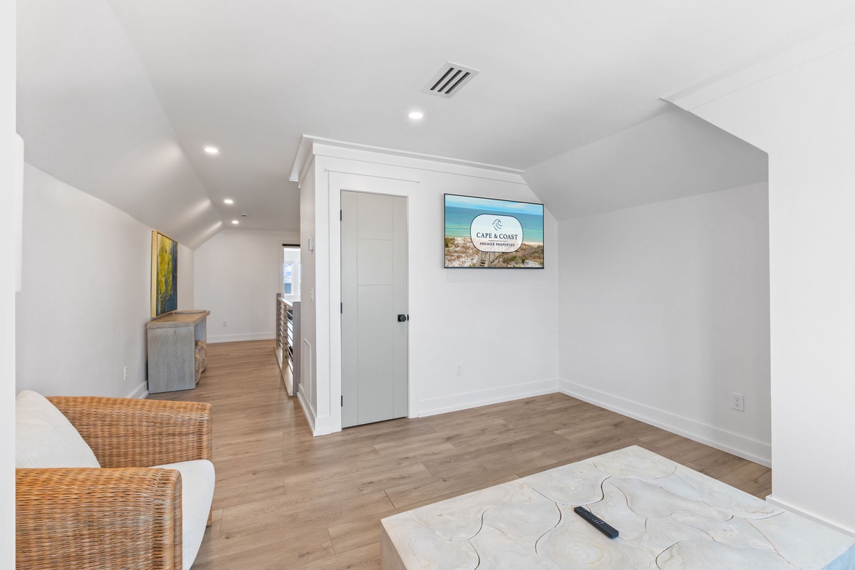 Unwind in your bright, modern living space with coastal charm and contemporary furnishings that invite relaxation.