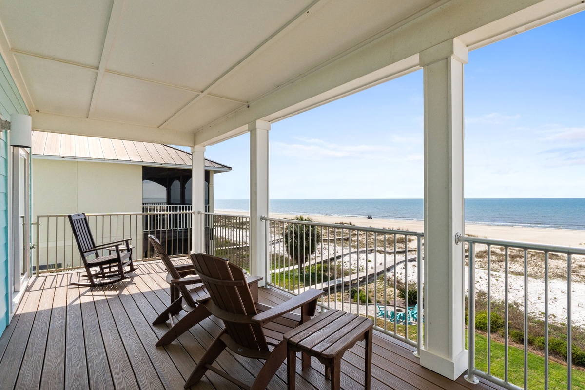 Picture yourself relaxing in this rocking chair, taking in the sweeping ocean views and feeling the coastal breeze. Your private balcony offers front-row seats to beach life and stunning seascapes.