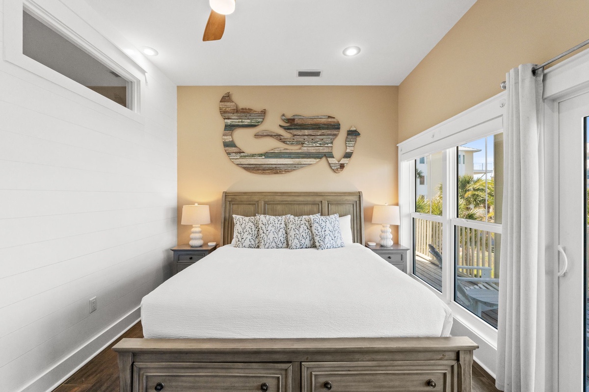 Drift off in your coastal-themed bedroom, where soft nautical touches and a comfortable queen bed create your perfect retreat.