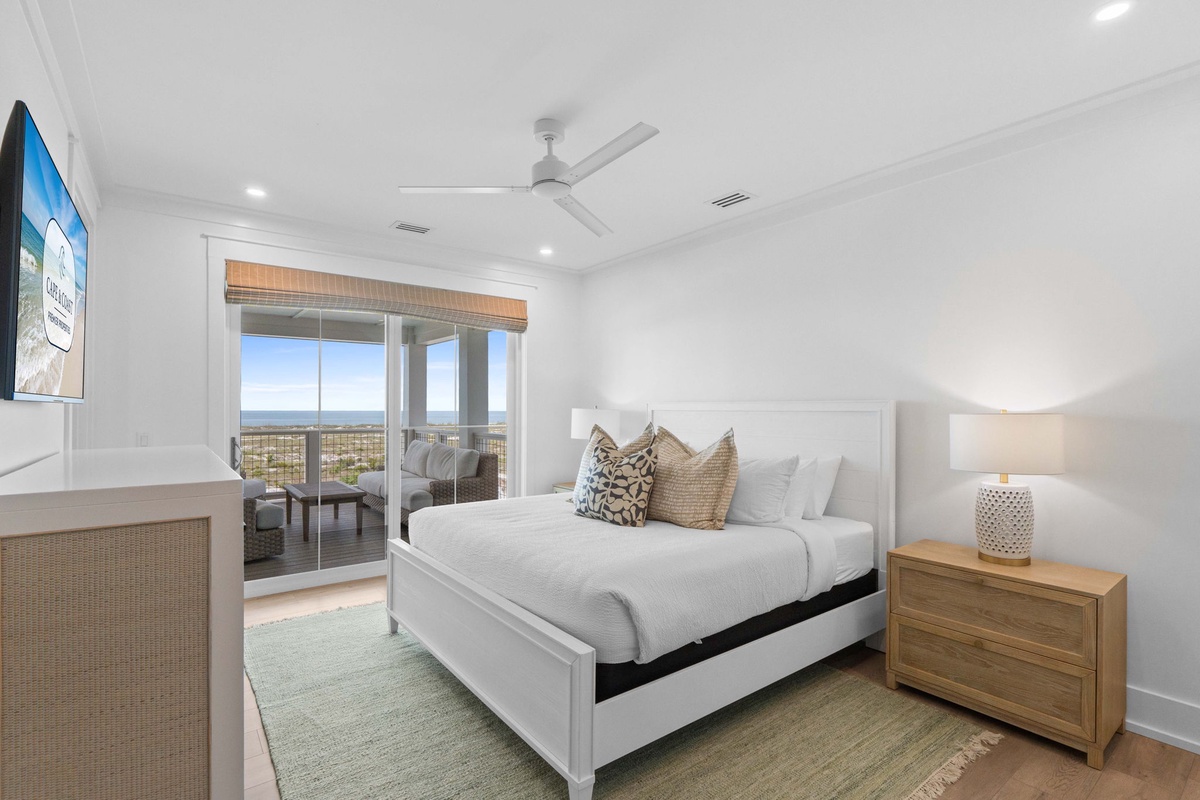 Wake to serene ocean views from your plush coastal bedroom—your private balcony awaits your morning coffee ritual.