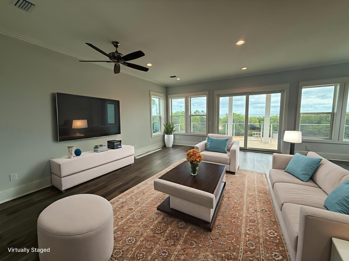 Unwind in your bright, modern living space with plush seating and panoramic views stretching to the horizon.
