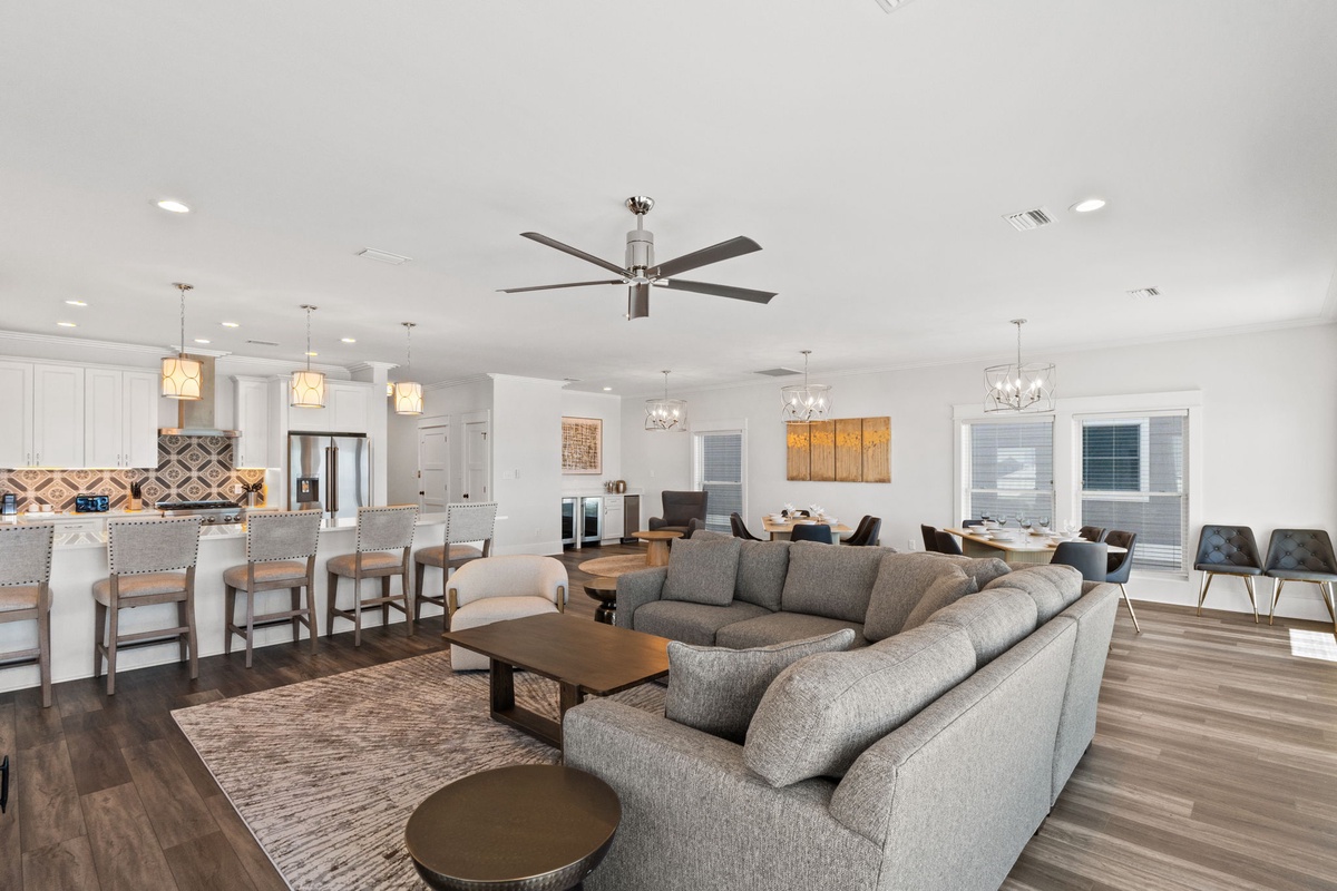 Relax in your spacious open living area where modern comfort meets elegant style—perfect for gathering with loved ones or unwinding after a day of adventure.