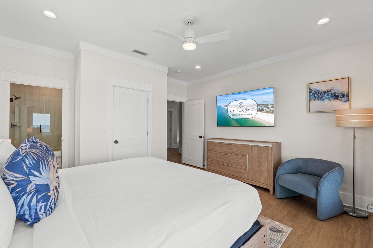 Sink into crisp linens and coastal calm. Your serene retreat features modern furnishings, a cozy reading nook, and thoughtful touches throughout.