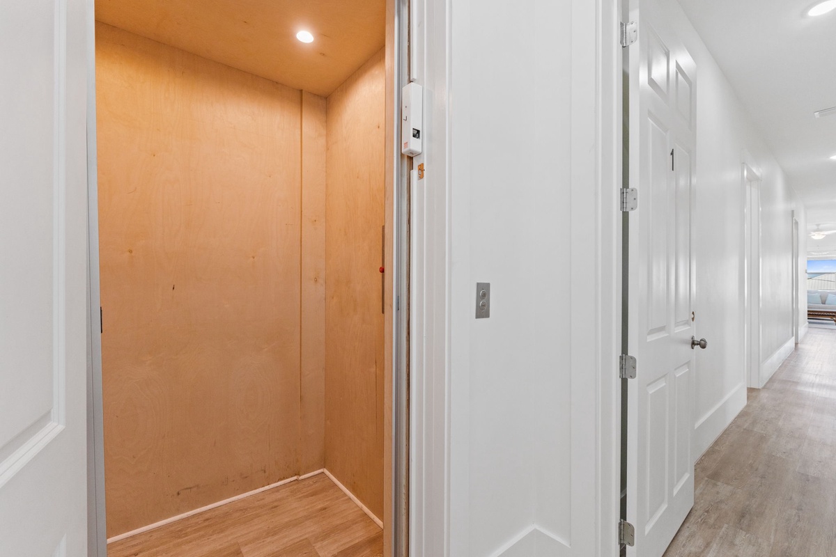 You'll find convenient storage in your dedicated closet space, with warm wood accents and ample room for all your belongings.