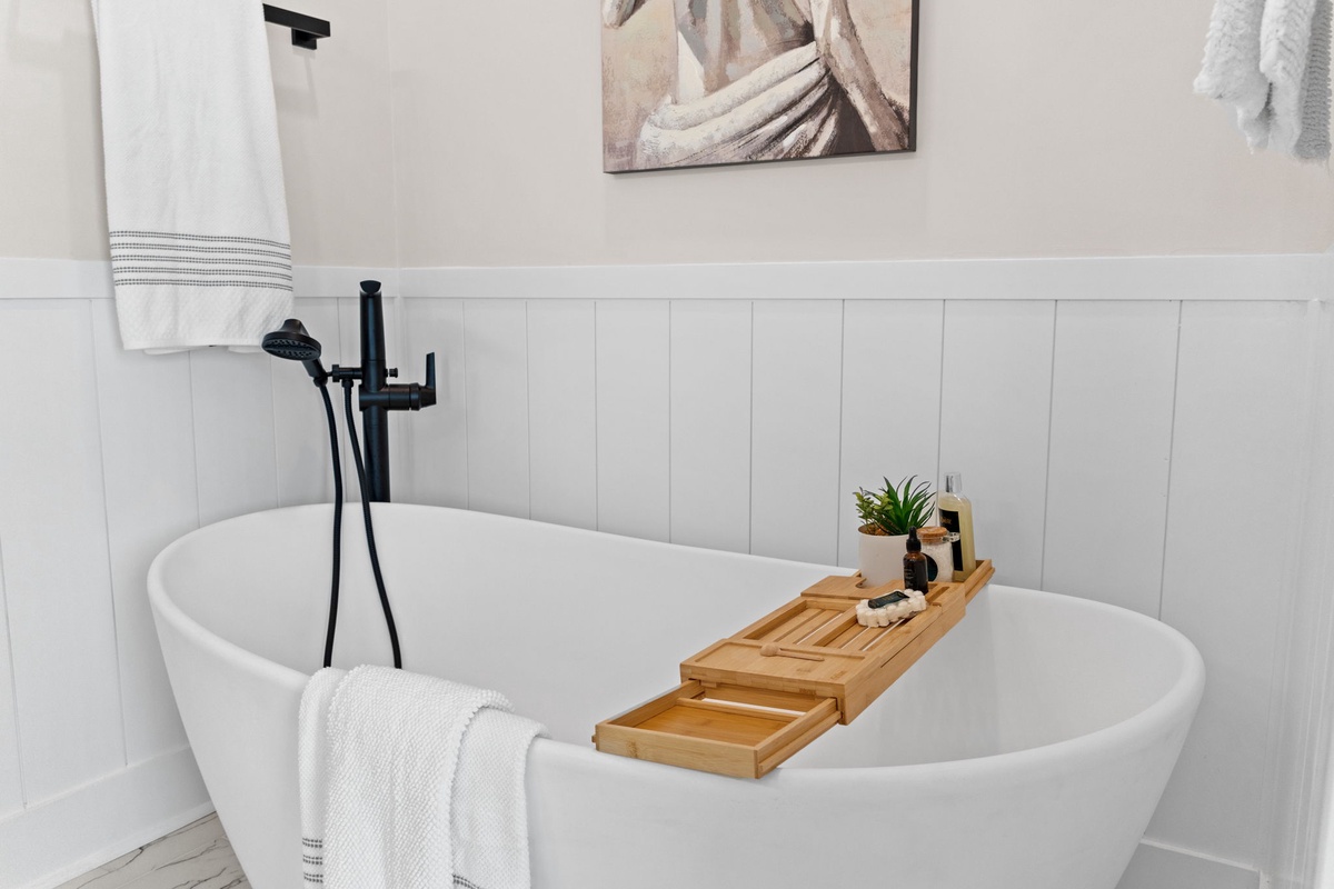 Sink into this luxurious freestanding tub after a long day. The elegant design and spa-like touches create your perfect retreat for unwinding and recharging.