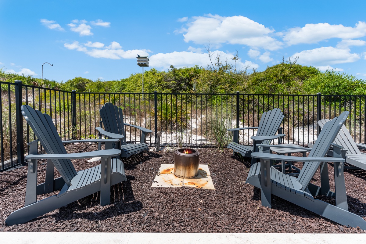 Gather around your private fire pit on comfortable Adirondack chairs for cozy evening conversations under the stars.