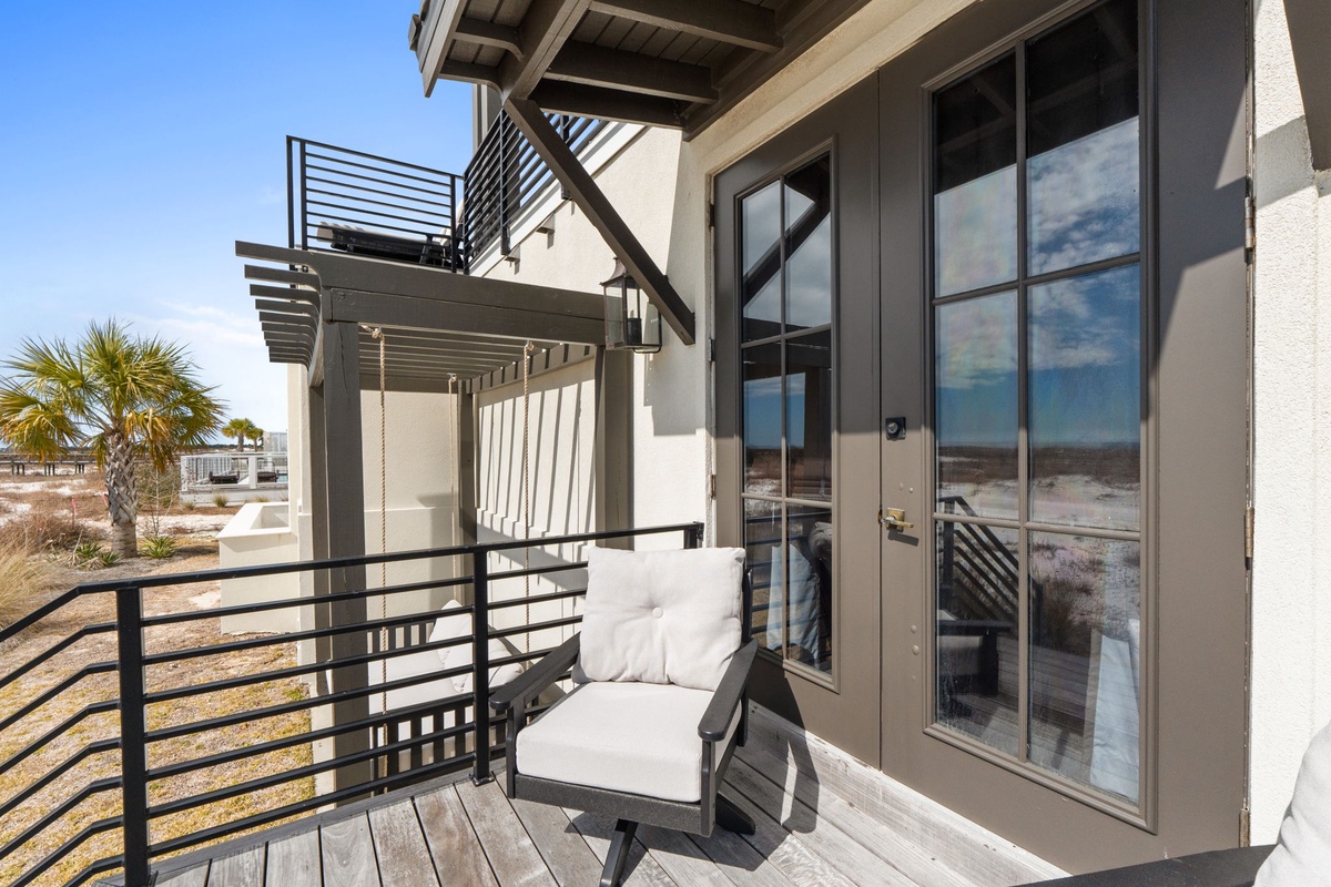 Sink into your private balcony chair and soak up the coastal views stretching beyond.