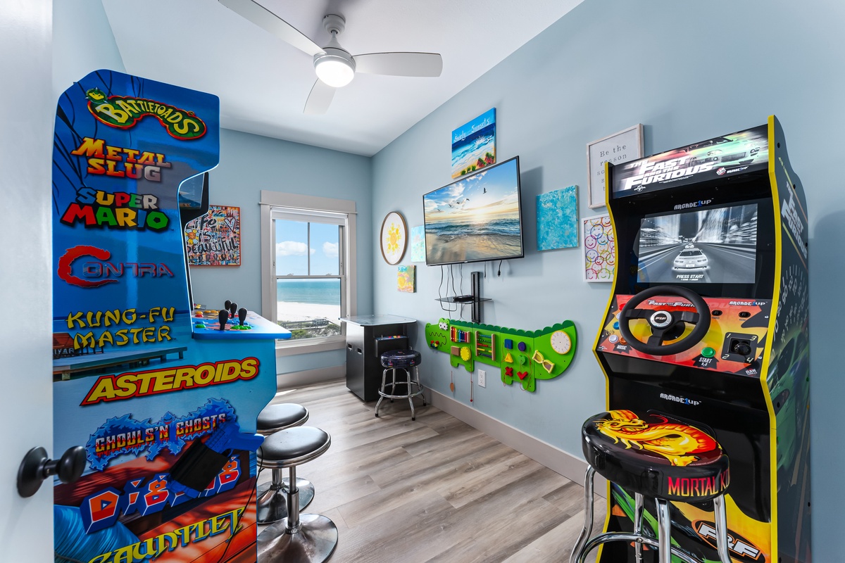 Your private arcade awaits with classic games and racing simulators, perfect for family fun after beach days.
