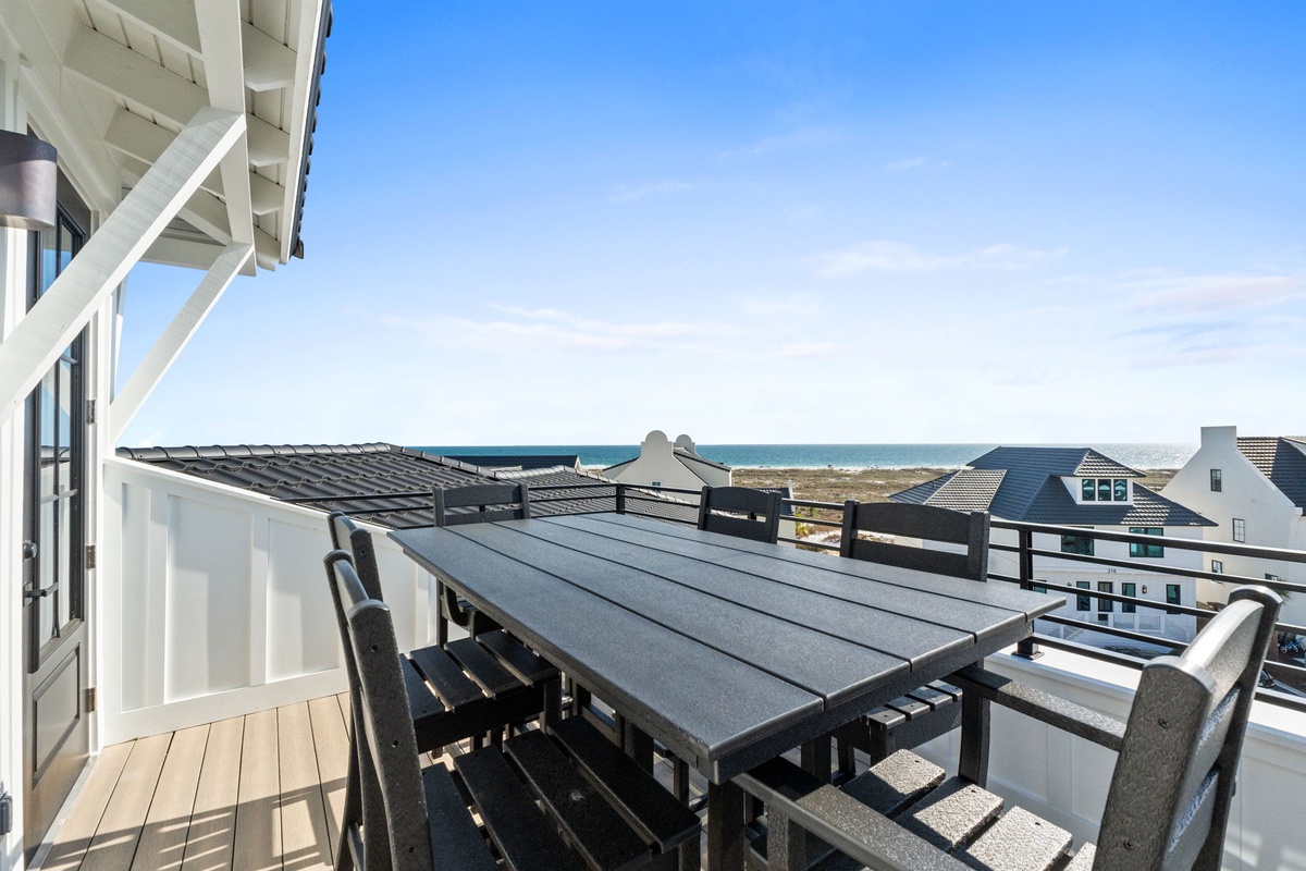 Enjoy meals and ocean breezes on your private terrace with stunning sea views and comfortable outdoor dining.