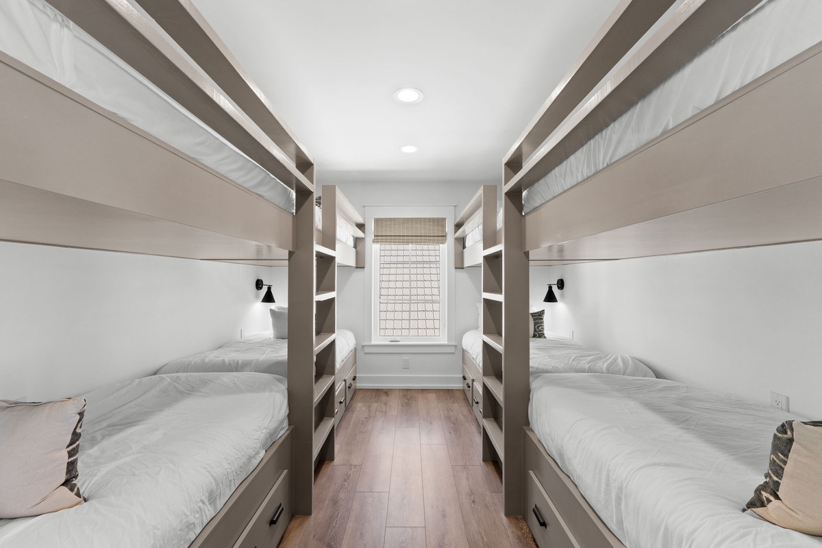 Sleep soundly in your cozy bunk room with built-in storage and personal reading lights for each bed.