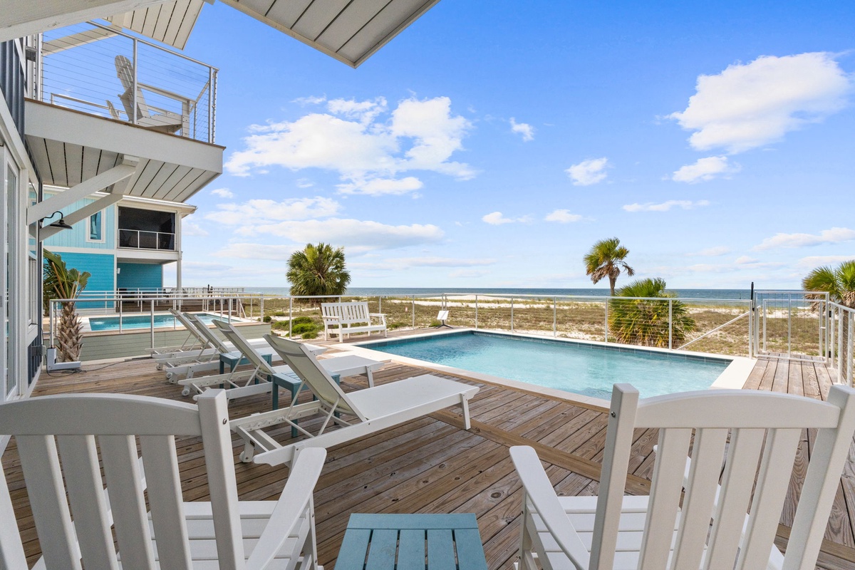 This beachfront paradise offers you a private pool, sun loungers, and a spacious deck where ocean breezes and coastal views create the perfect backdrop for your escape. Grab your favorite drink and settle in—you're steps from the sand.