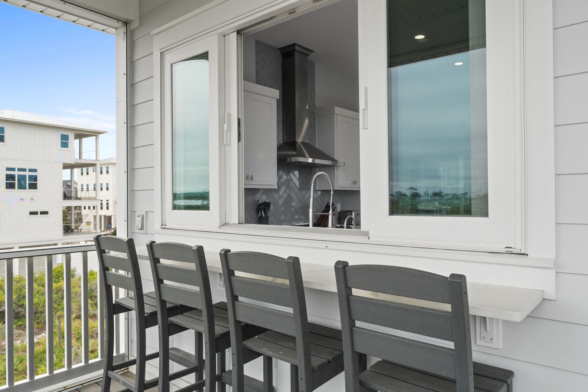Sip morning coffee at your private kitchen window bar, where coastal breezes and stunning views create the perfect start to your day.
