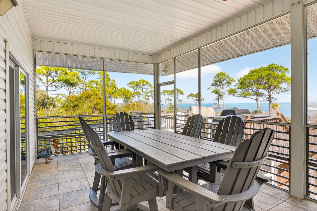 Step onto your private covered balcony where morning coffee tastes better with stunning ocean and treetop views stretching to the horizon.