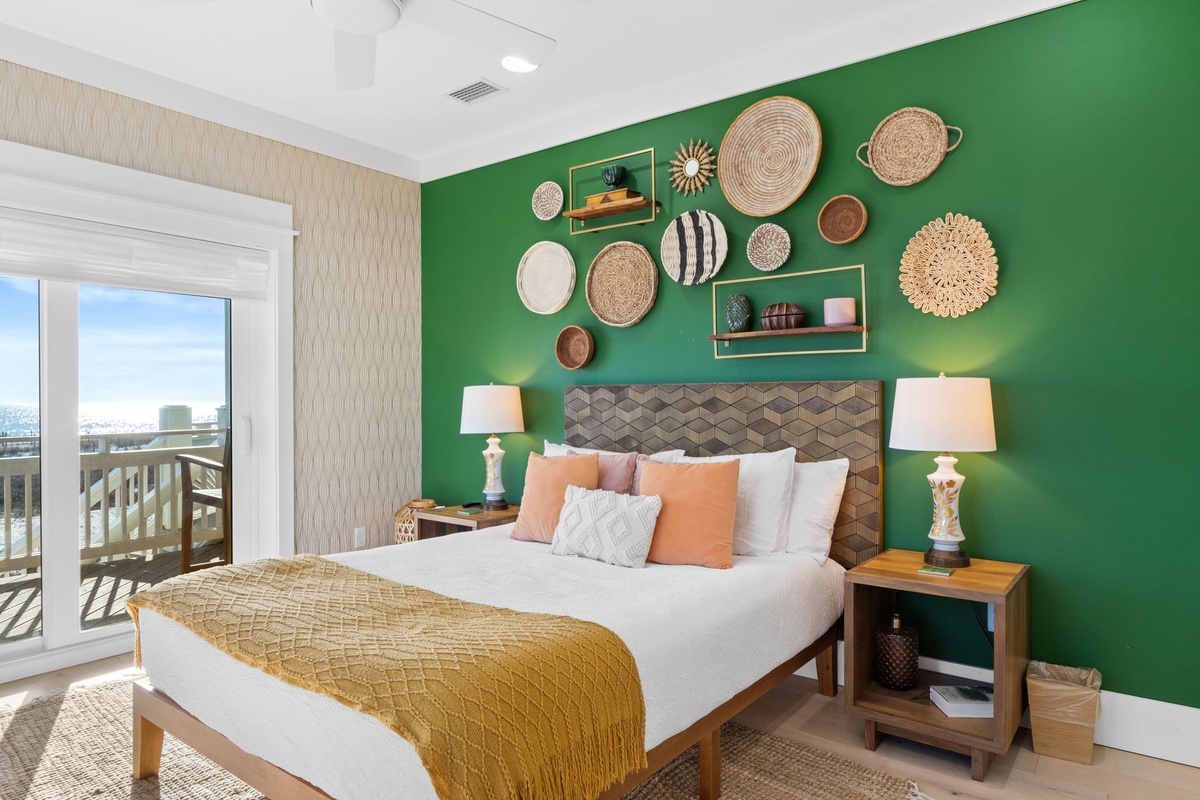 Sink into plush bedding beneath a stunning woven basket gallery wall, where warm lighting and vibrant green accents create your perfect retreat.