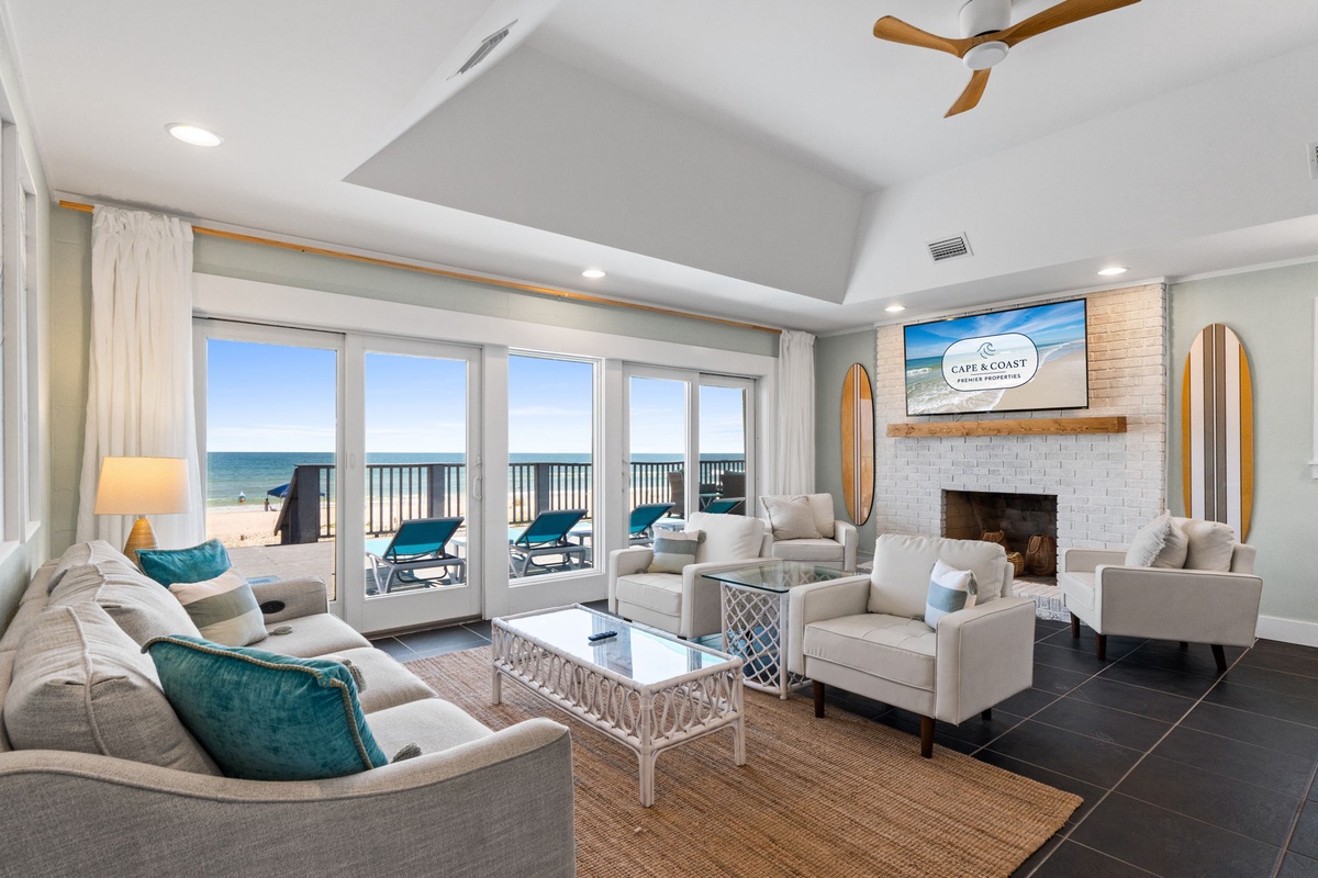 Unwind in your bright coastal living room where plush seating and ocean views invite you to relax. Step onto your private balcony to feel the sea breeze.
