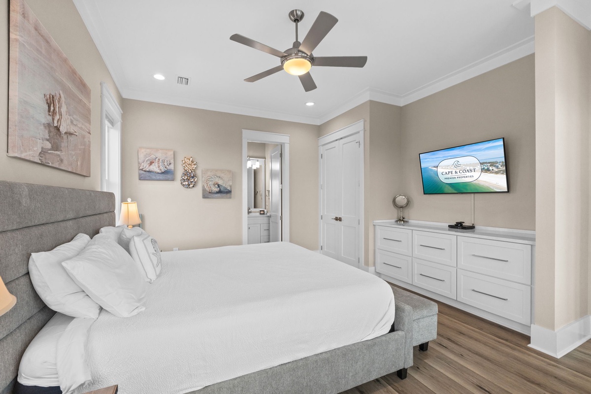 Sink into plush bedding and unwind in your coastal-inspired retreat, where soft neutral tones and beach-themed touches create a peaceful escape. Your private ensuite awaits just steps away.