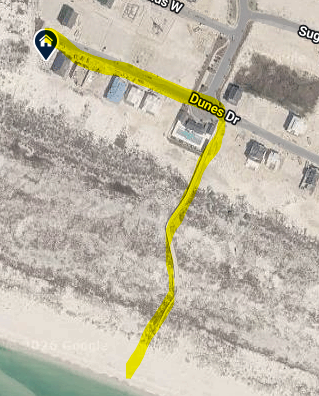 Aerial view showing the property's location with convenient beach access from community boardwalk to pristine white sand shores.